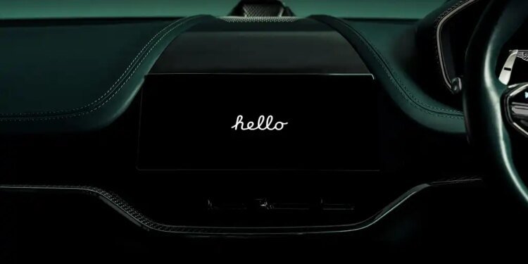 Aston Martin dashboard with Apple CarPlay Ultra saying hello