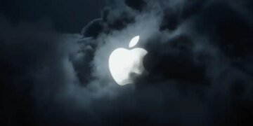 Apple logo behind clouds