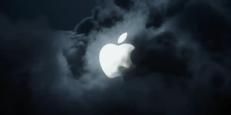 Apple logo behind clouds