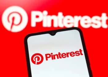 In this photo illustration, the Pinterest logo is seen displayed on a smartphone screen.