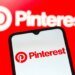 In this photo illustration, the Pinterest logo is seen displayed on a smartphone screen.