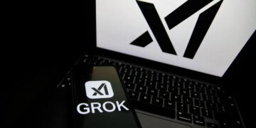 The Grok logo appears on a phone and the xAI logo is displayed on a laptop.