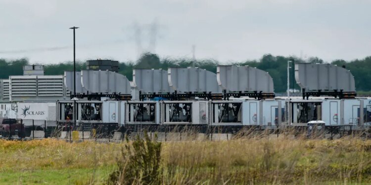 Gas turbines are visible at an xAI data center on Riverport Rd in Memphis, TN on April 25, 2025.