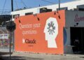 Claude ad on side of building