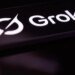 The Grok logo is displayed on a mobile phone screen