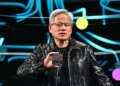 Jensen Huang holds up chip at CES 2025