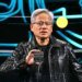 Jensen Huang holds up chip at CES 2025
