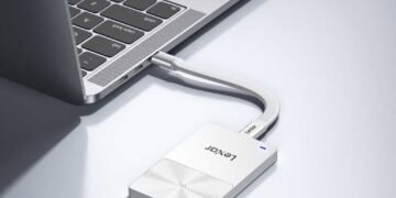 Photo of TouchLock drive connected to laptop computer.